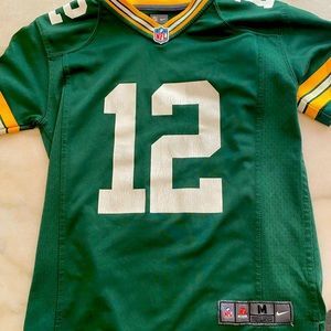 Official Nike NFL Packers Rogers kid’s M jersey.